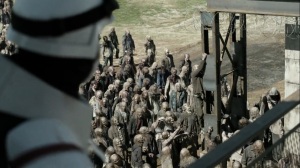 Family- Soldier notices walkers climbing the gates- AMC, The Walking Dead
